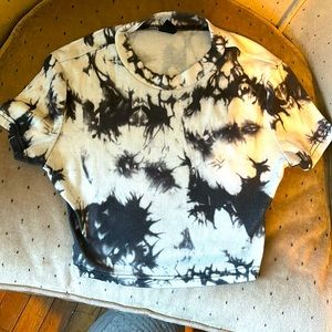 This is a shirt from SHEIN and it has never been worn so it is like brand new.